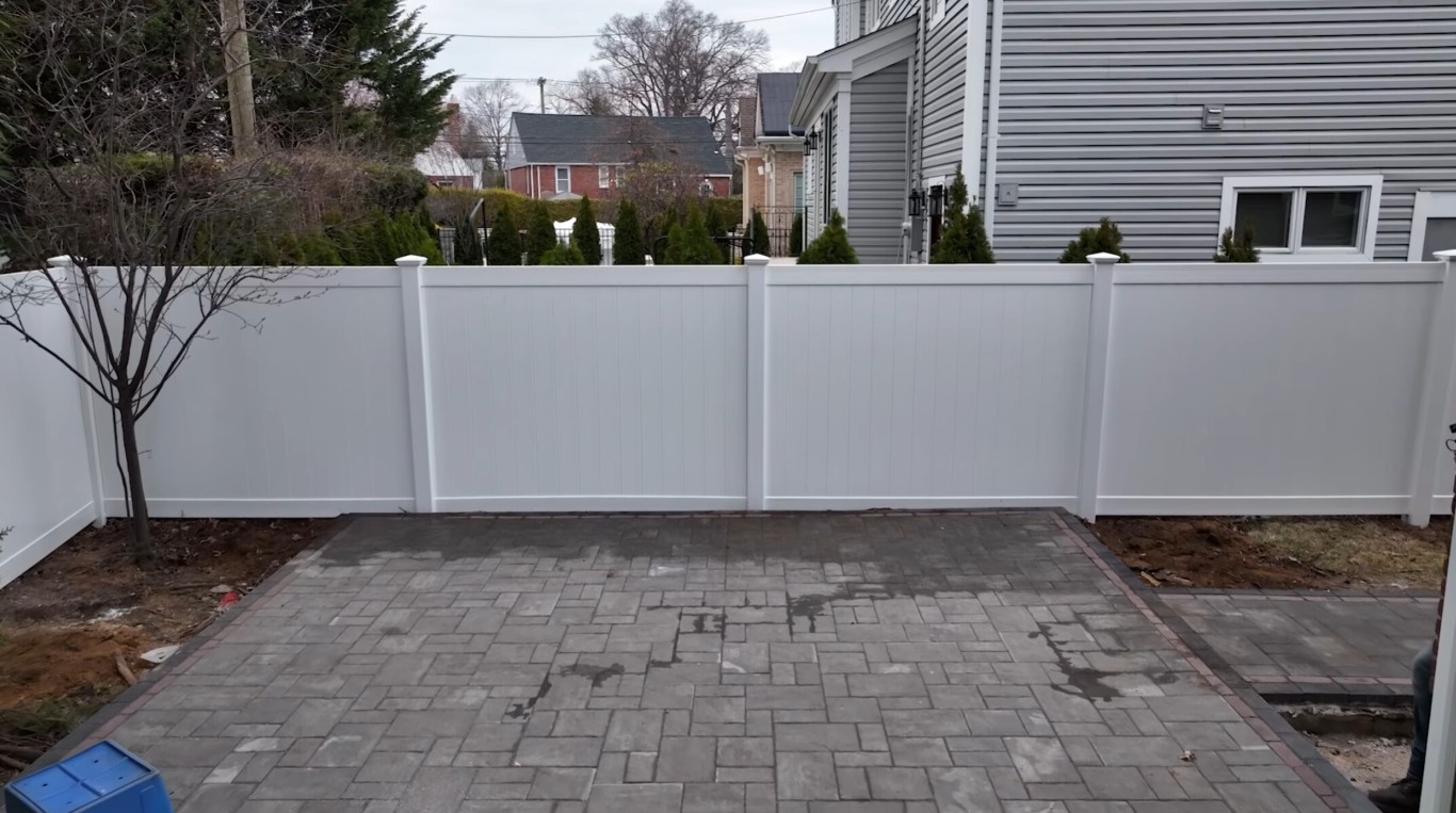 Durable vinyl privacy fence installation